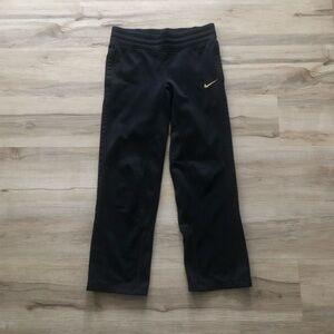Nike Black Track Pants with Gold Swoosh